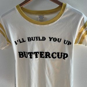 Understated leather “Build me you up, buttercup” XS ringer tee